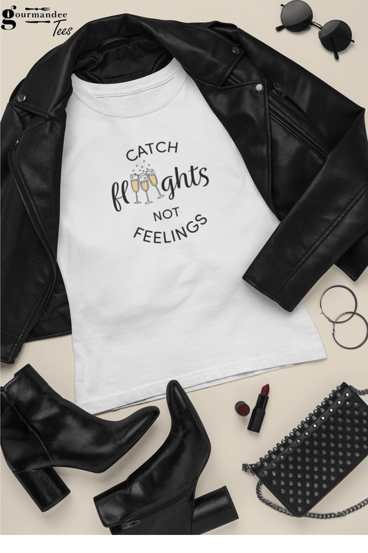 Catch Flights Not Feelings wine-themed t-shirt styled with black leather jacket, boots, and accessories for TO Food & Drink Fest outfit.