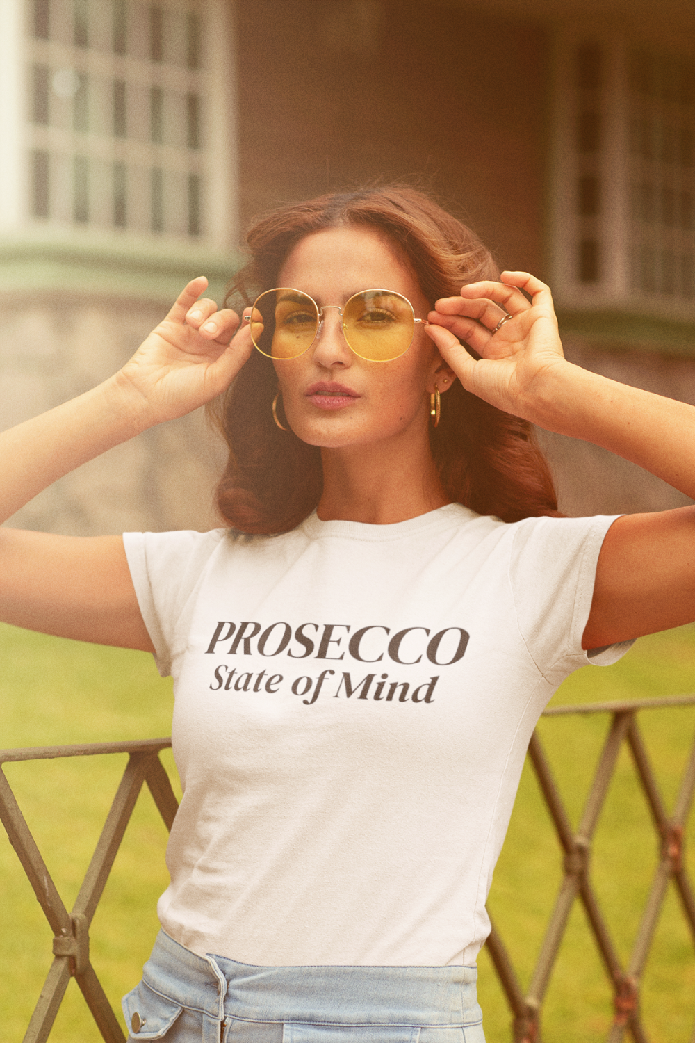 Woman wearing Prosecco State of Mind white t-shirt outdoors, wine lifestyle apparel by Gourmandee Tees